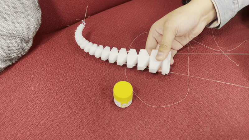 Omu's articulated tail moving during a fabrication test